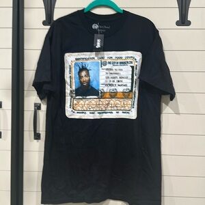 NWT Spencer’s graphic tee size large. Pit 22”. Length 29”.